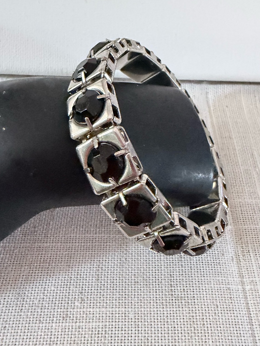 vintage-style bracelet resembles silver link designs featuring black spinel gems